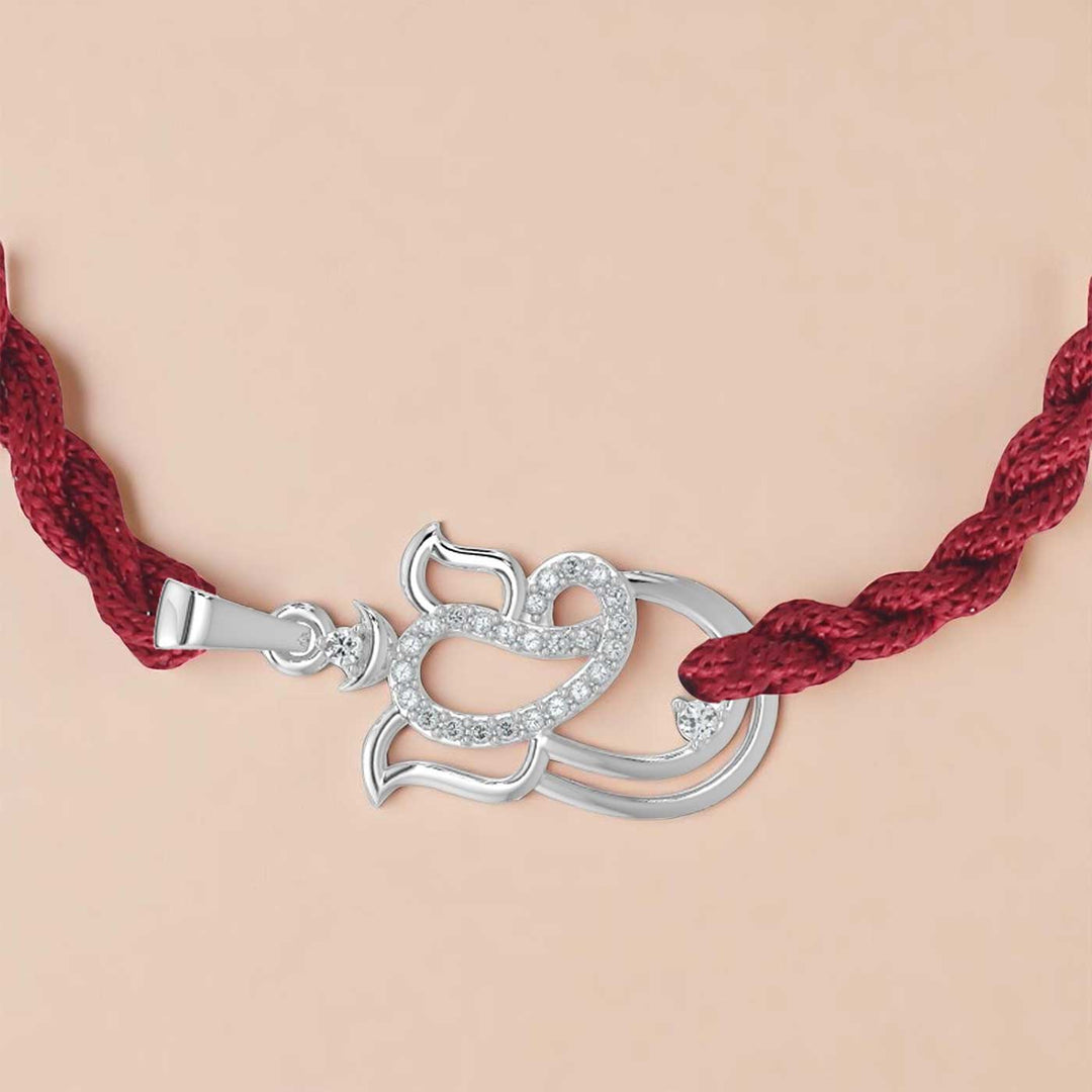 Handmade Ganesha Design Religious Silver Rakhi For Brother - Detailed close-up of pendant on bracelet
