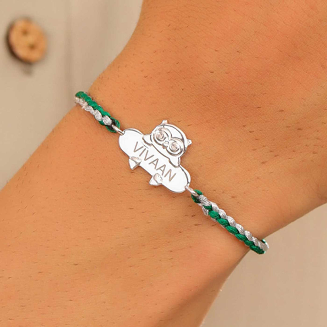 Personalized Handmade Owl Design Silver Kids Rakhi - Worn on Wrist View