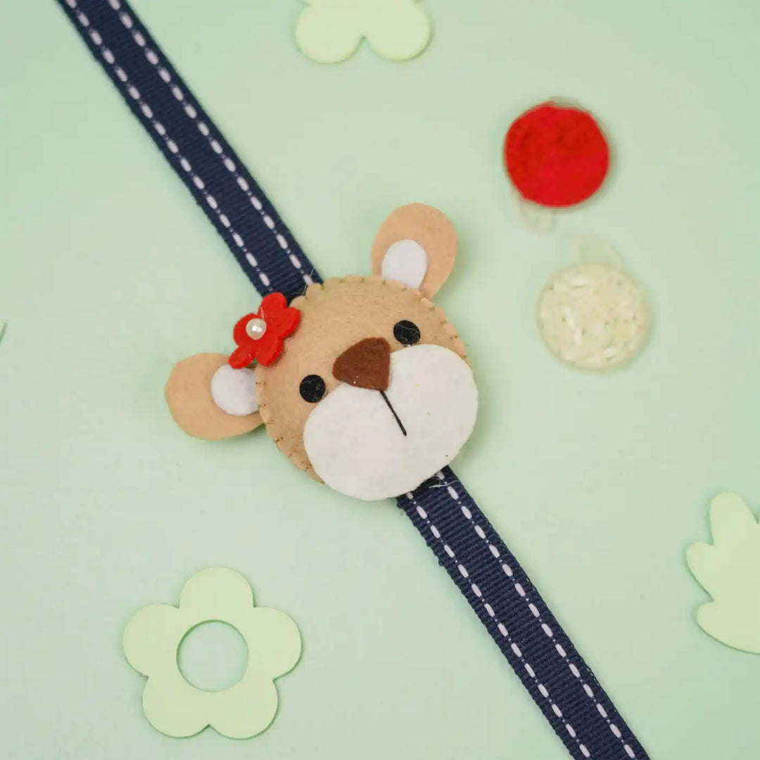Handmade Bear Theme Felt Kids Rakhi With Roli Chawal - Top View with Decorative Elements