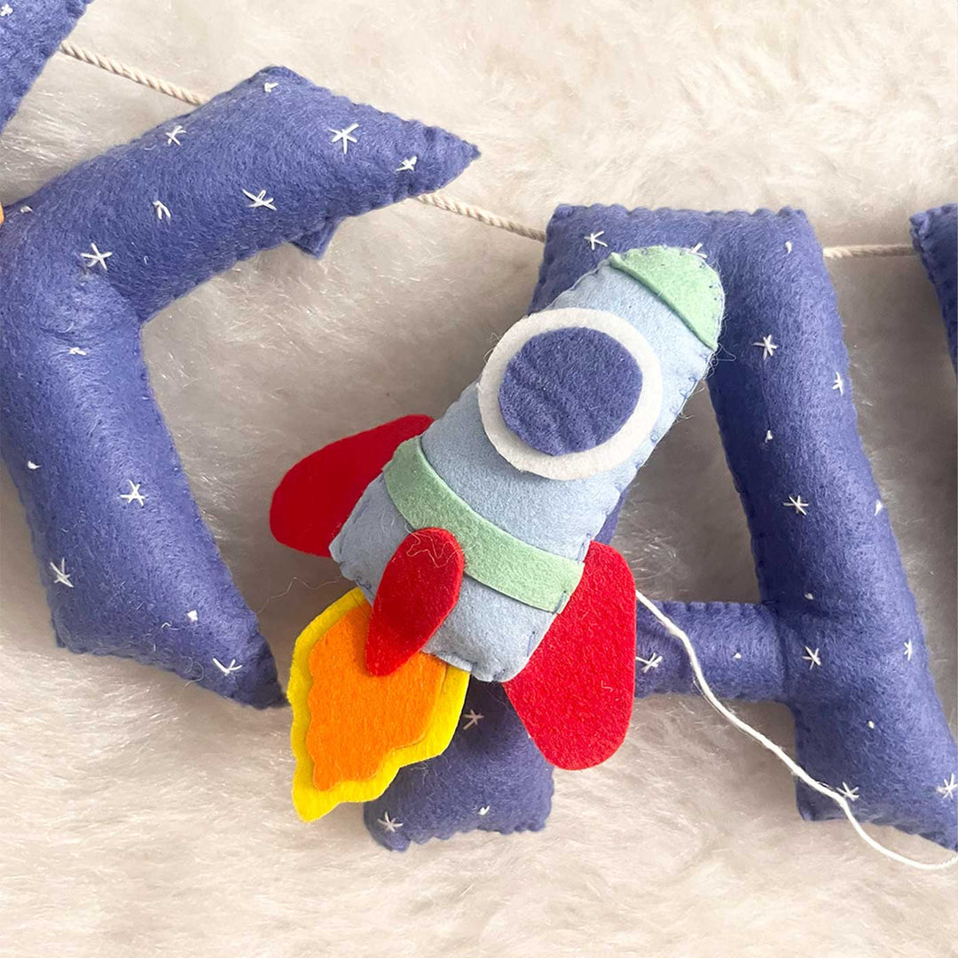 Handcrafted Personalized Space Themed Bunting For Kids - Close-up of Hanging Plush Garland