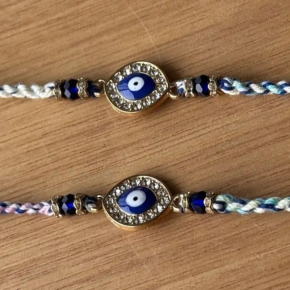Handmade Stone Embedded Evil Eye Rakhi With Roli Chawal - Bracelet Detail Flat Lay