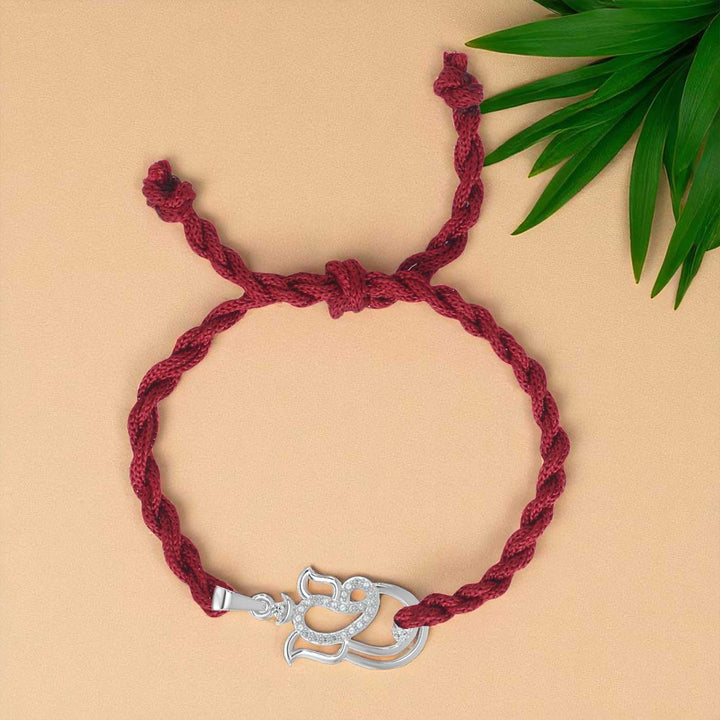 Handmade Ganesha Design Religious Silver Rakhi For Brother - Full view of braided bracelet with pendant