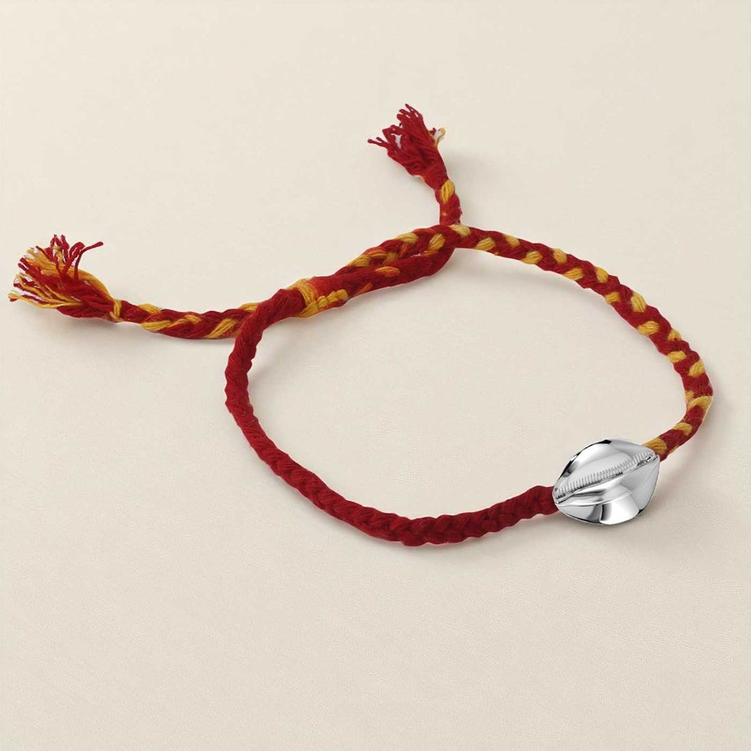 Handmade Shell Design Silver Rakhi For Brother - Braided Rope Bracelet Flat Lay