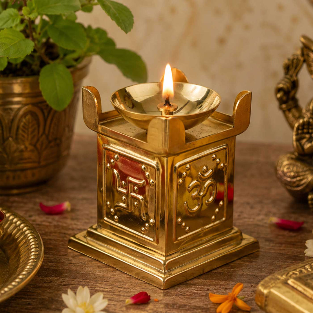 Om & Swastik Brass Tulsi Oil Lamp With Built-in Stand For Festive Decor
