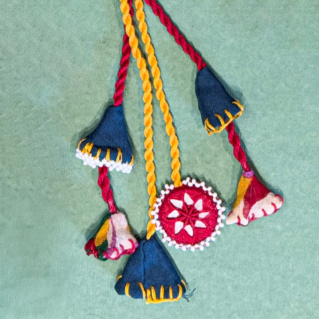 Reusable Mirror And Cotton Rope Rakhi For Bhabhi - Close-up of Hanging Tassels Detail
