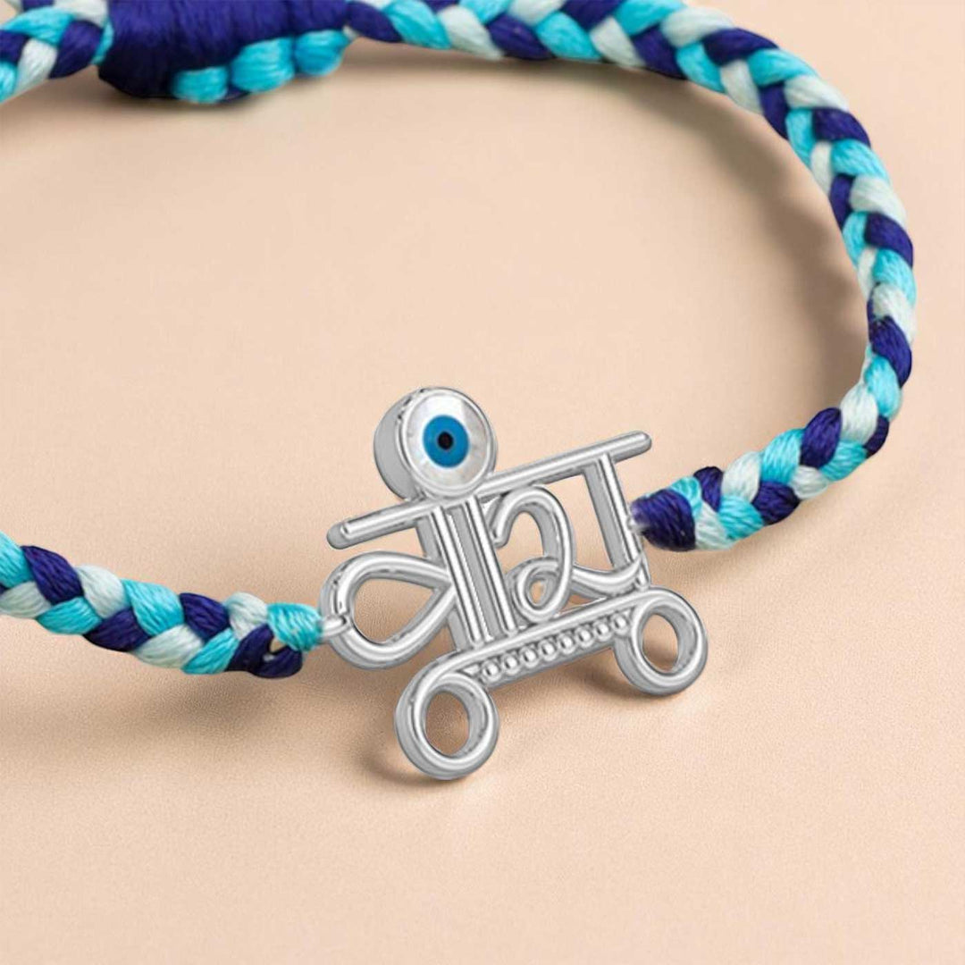 Handmade Veera Design Evil Eye Silver Rakhi For Brother - Side Angle Close-up