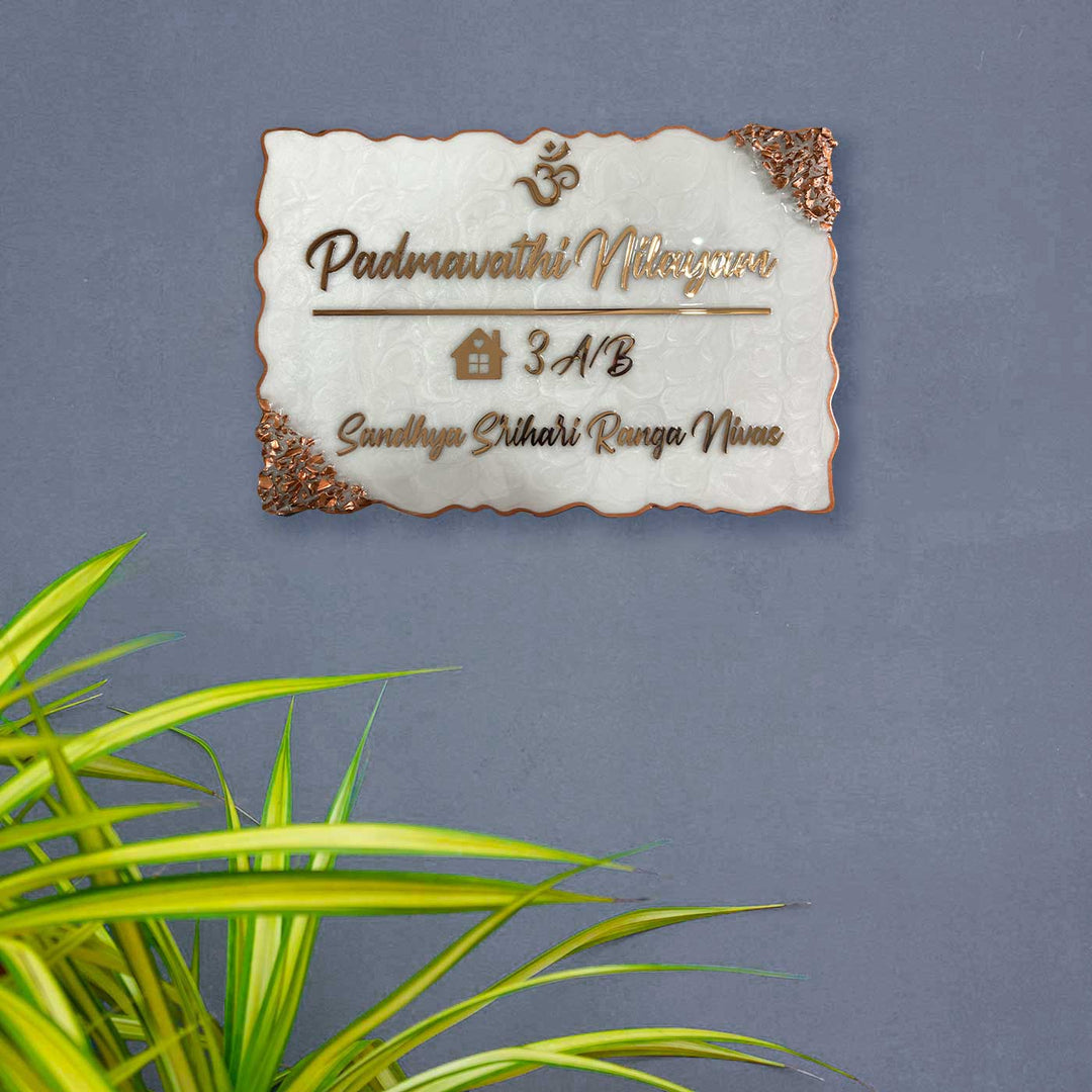 Personalized Pearl White Swirl Design Resin Name Plate - Mounted on Exterior Wall with Plant