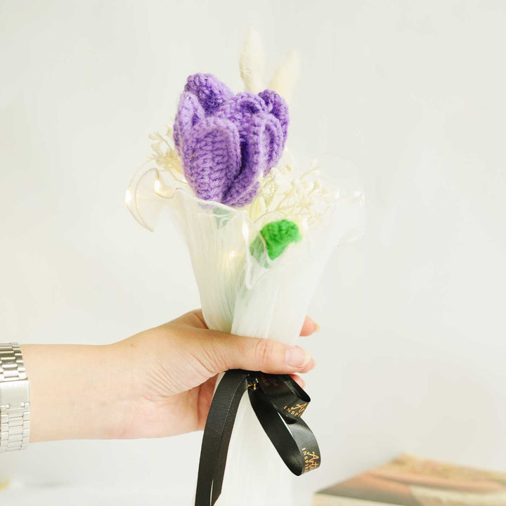 Personalized Handmade Crochet Purple Lily Rakhi Hamper Includes 1 Crochet Flower 1 Message Card And 1 Rakhi And Roli Chawal - Handheld Close Detail View