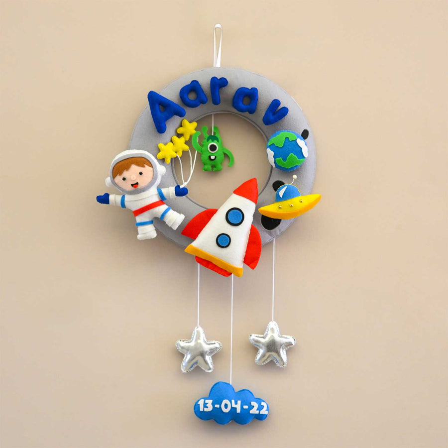 Personalized Astronaut Adventure Theme Round Felt Kids Nameplate - Front View Hanging with Name Personalization