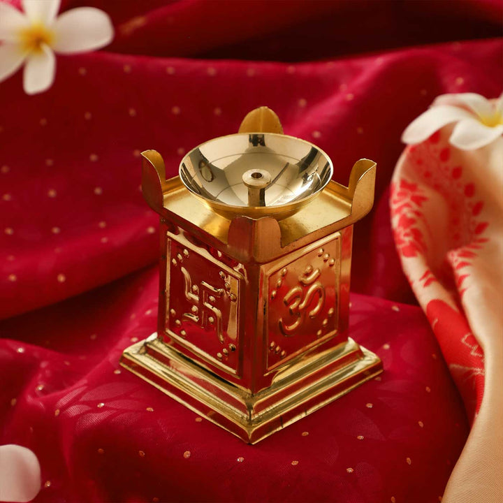 Om & Swastik Brass Tulsi Oil Lamp With Built-in Stand For Festive Decor