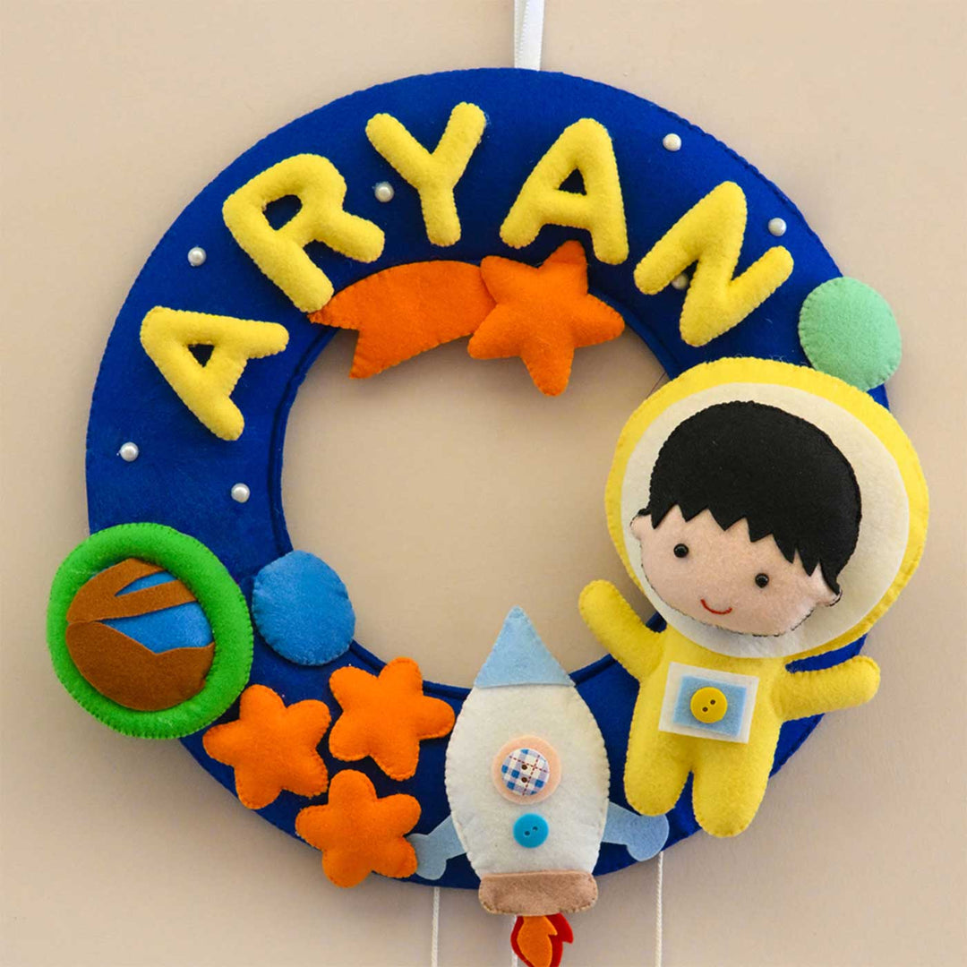 Personalized Space Voyager Theme Round Felt Kids Nameplate - Front View Hanging on Wall (6)