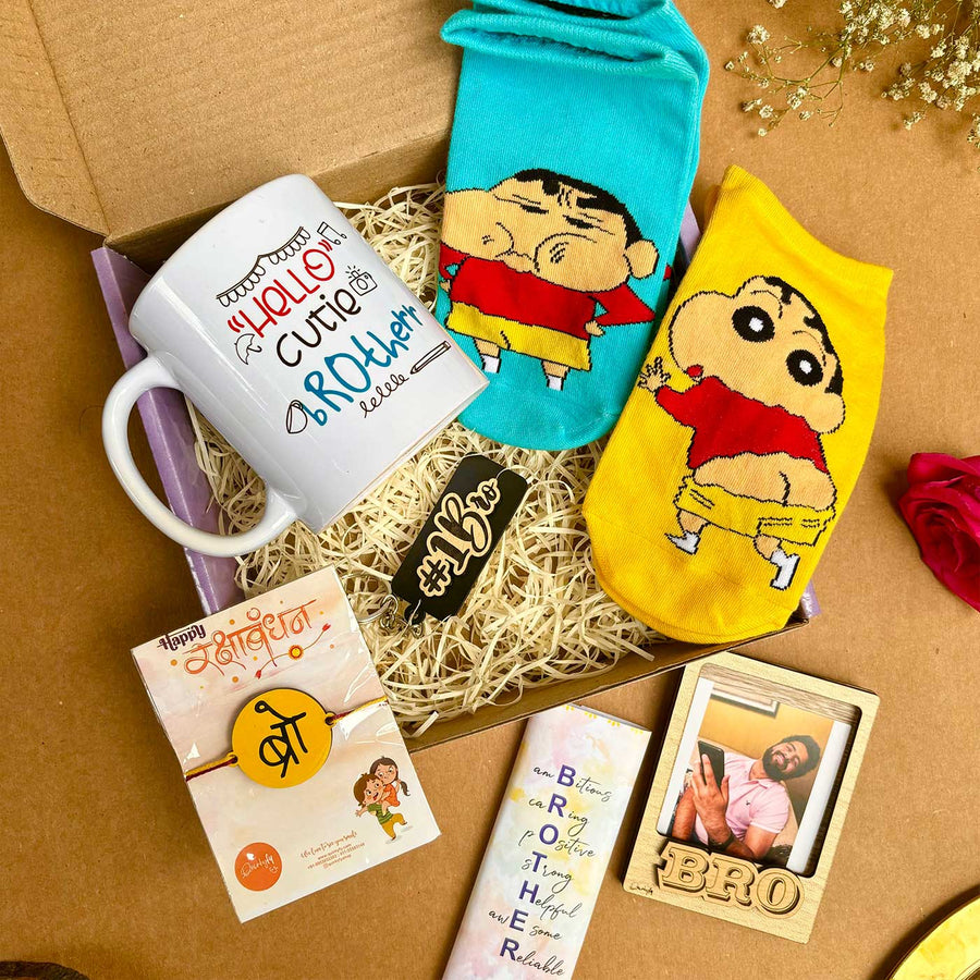Photo Personalized Shinchan Theme Rakhi Hamper For Brother Includes 1 Rakhi 2 Pair Socks 1 Keychain 1 Fridge Magnet 1 Chocolate And 1 Mug - Gift Set Display