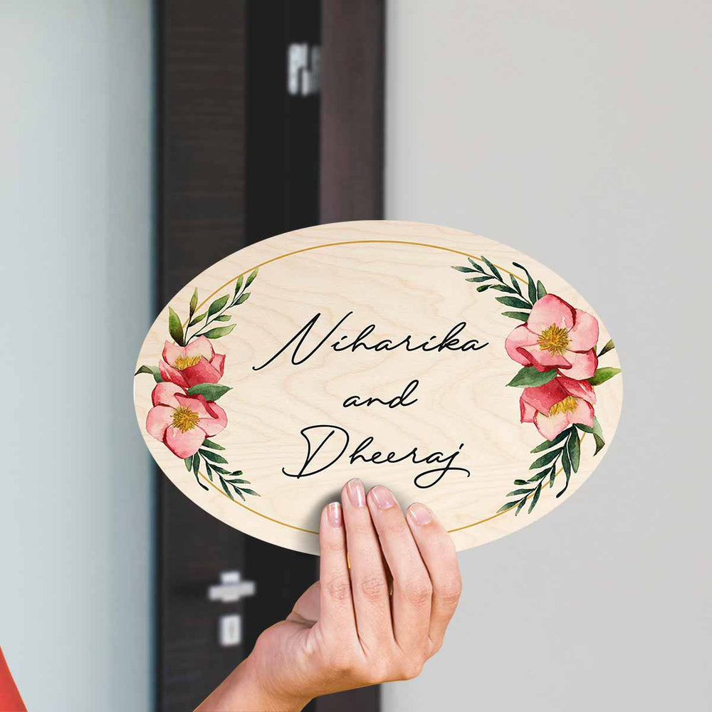 Printed Floral Wooden Oval Nameplate For Couples 1 - Handheld Front View with Personalization
