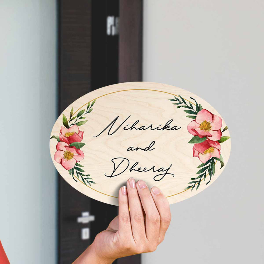 Printed Floral Wooden Oval Nameplate For Couples 1 - Handheld Front View with Personalization