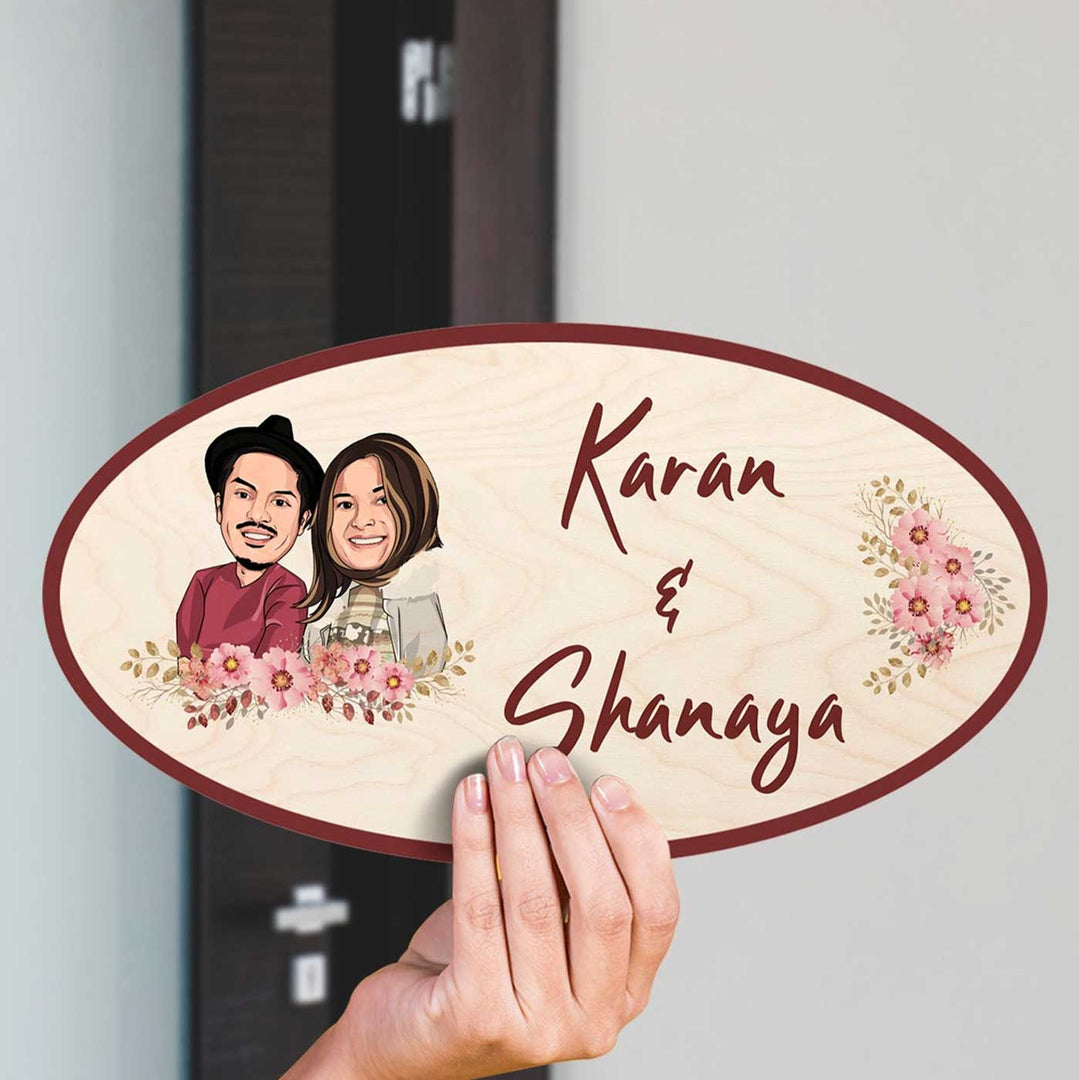 Printed Wooden Oval Character Nameplate For Couples 3 - Name Personalization Example Held in Hand