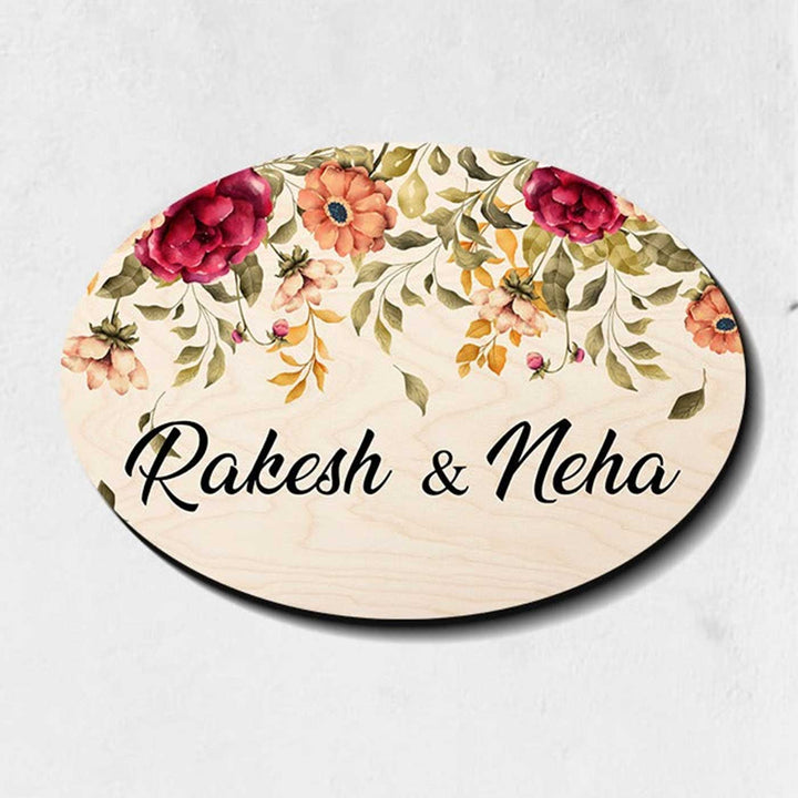 Printed Red And Orange Floral Wooden Oval Nameplate For Family - Front View Name Personalization Example