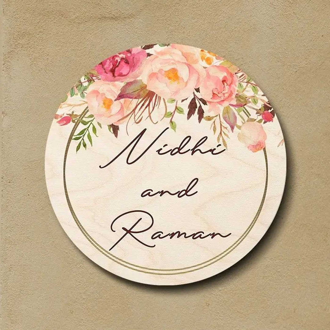 Printed Pink Floral Wooden Round Nameplate For Couples - Front View with Name Personalization