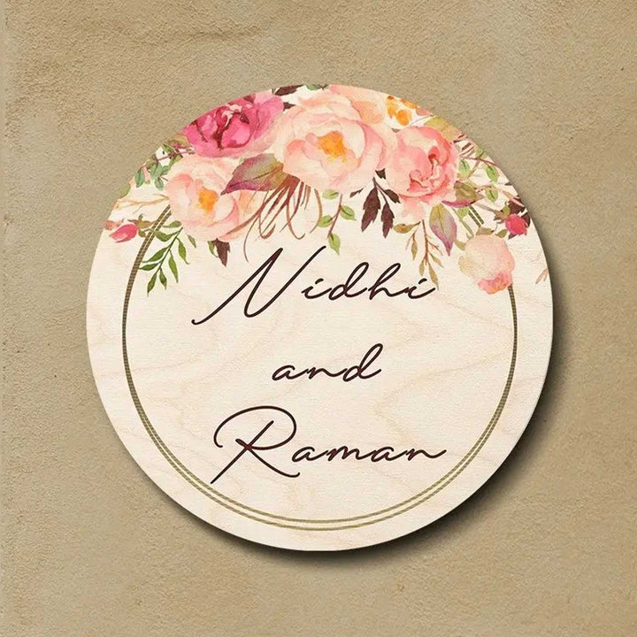 Printed Pink Floral Wooden Round Nameplate For Couples - Front View with Name Personalization