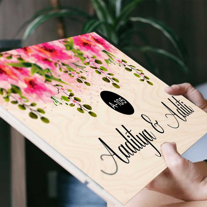 Printed Pink Floral Wooden Rectangle Nameplate - Close-up Held at Angle