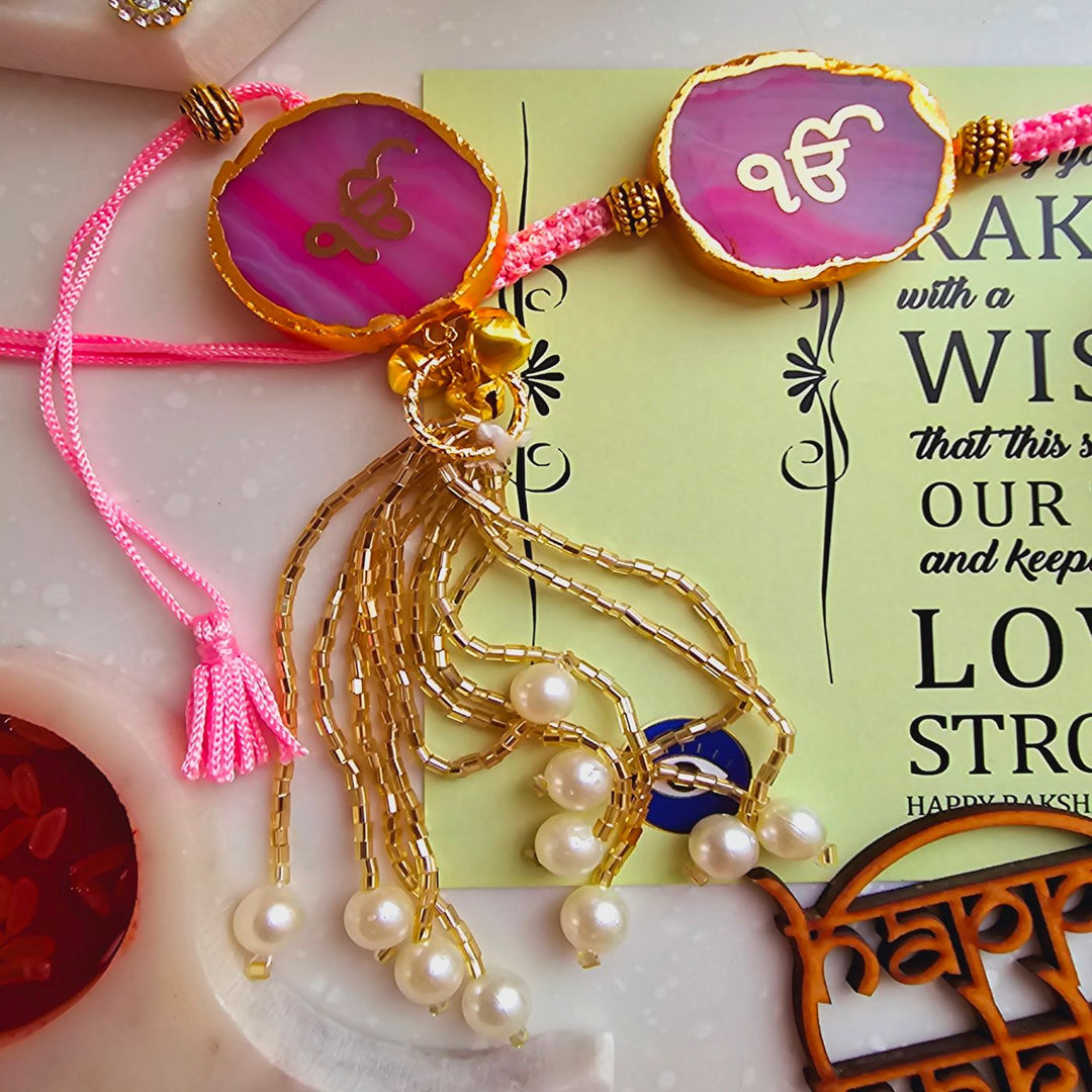 Handmade Ik Onkar Agate Bhaiya Bhabhi Rakhi With Roli Chawal - Pink Rakhi Front View