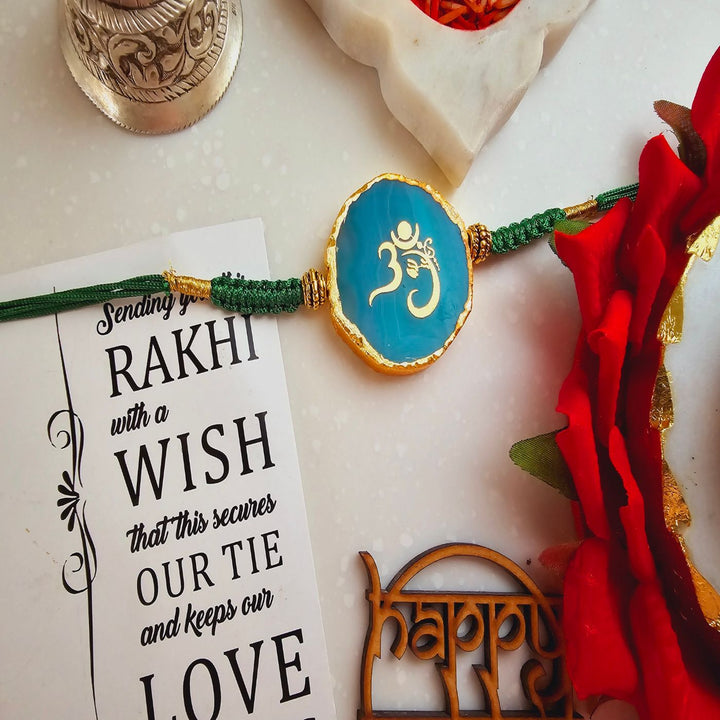 Handmade Om Agate Rakhi With Roli Chawal For Brother - Green Rakhi Front View
