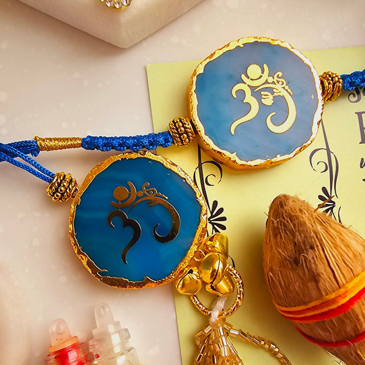 Handmade Om Agate Bhaiya Bhabhi Rakhi With Roli Chawal - Detailed Close-up of Blue Rakhi