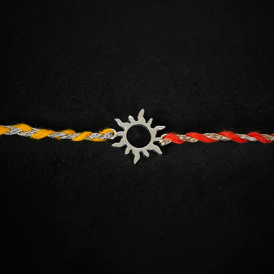 Handmade Aditya 925 Silver Rakhi With Roli Chawal For Brother - Close-up of central sun charm