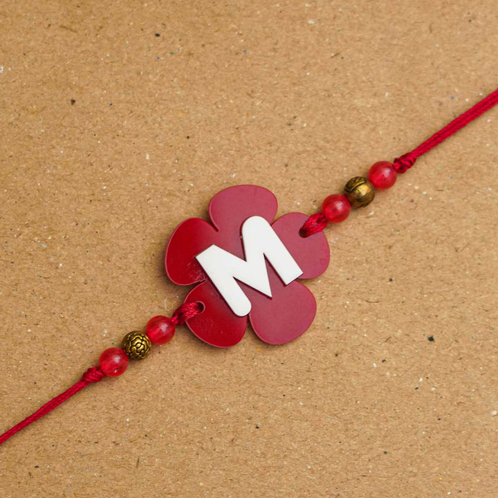 Personalized Handmade Alphabet Flower Acrylic Rakhi With Roli Chawal - Close-up of bracelet detail