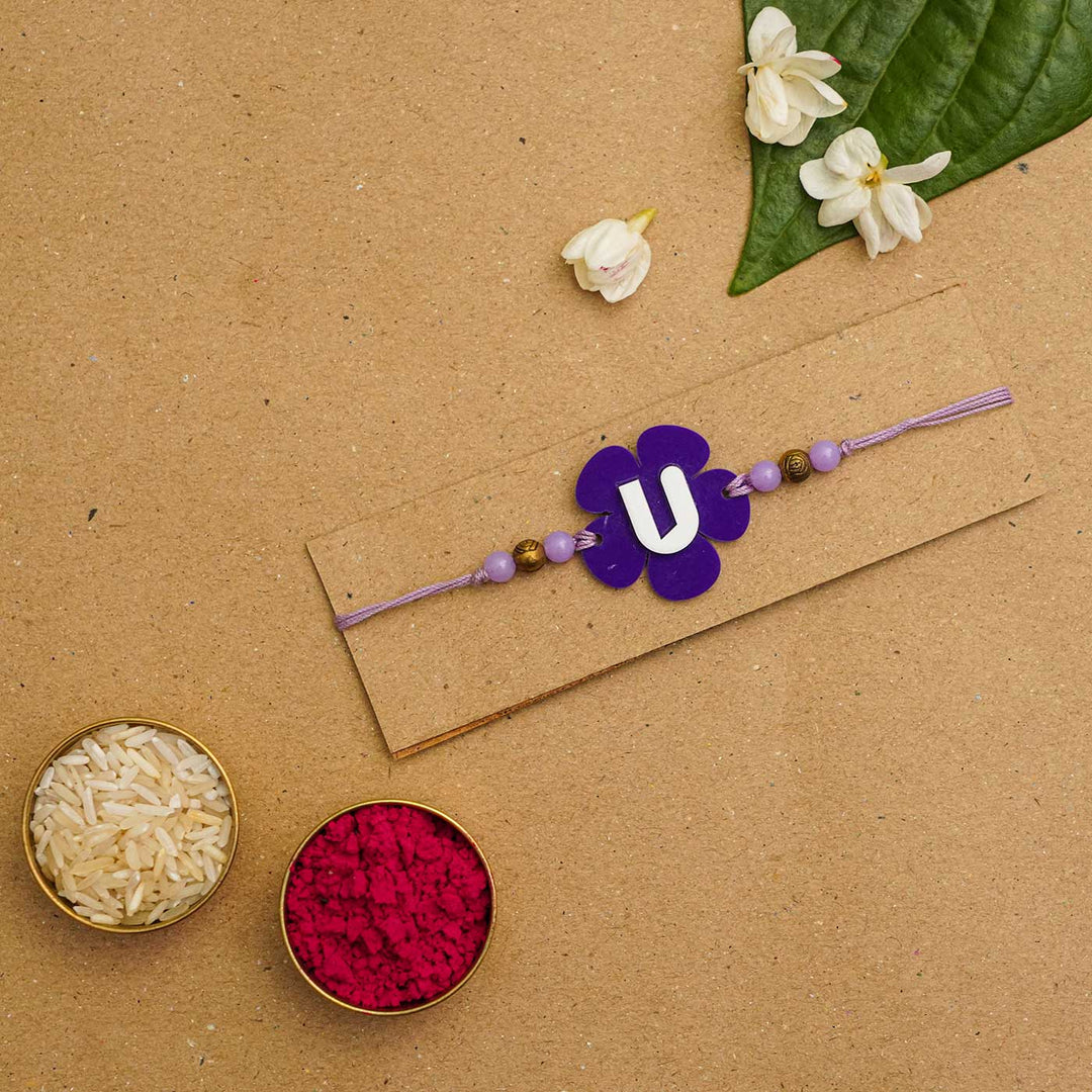 Personalized Handmade Alphabet Flower Acrylic Rakhi With Roli Chawal - Packaged with rice and powder (8)