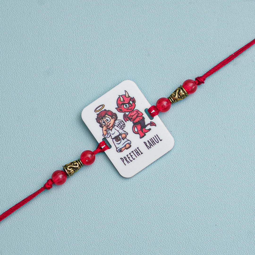 Personalized Handmade Printed Bro And Sis Acrylic Rakhi With Roli Chawal - Front View with Character Design