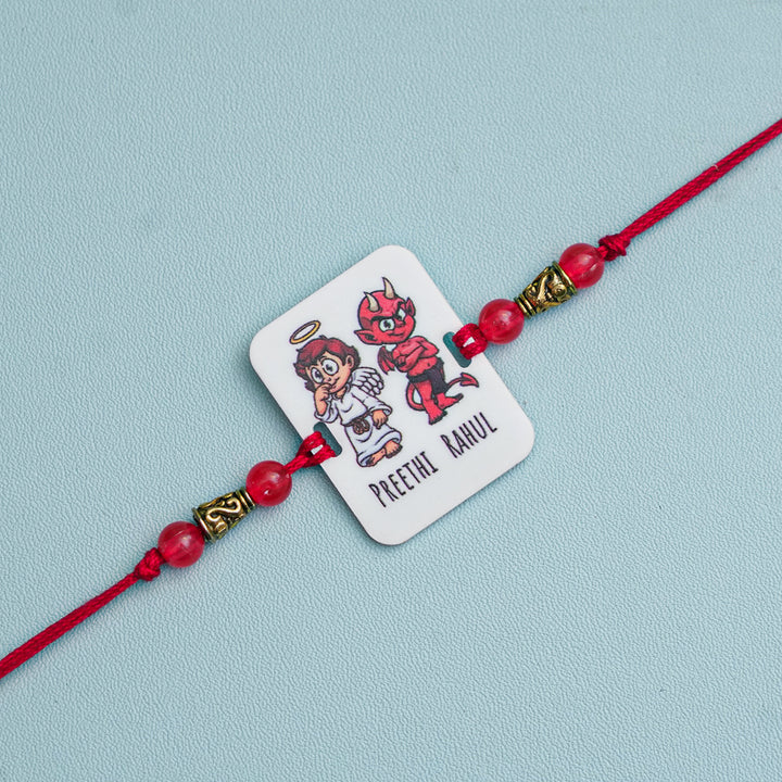 Personalized Handmade Printed Bro And Sis Acrylic Rakhi With Roli Chawal - Front View with Character Design