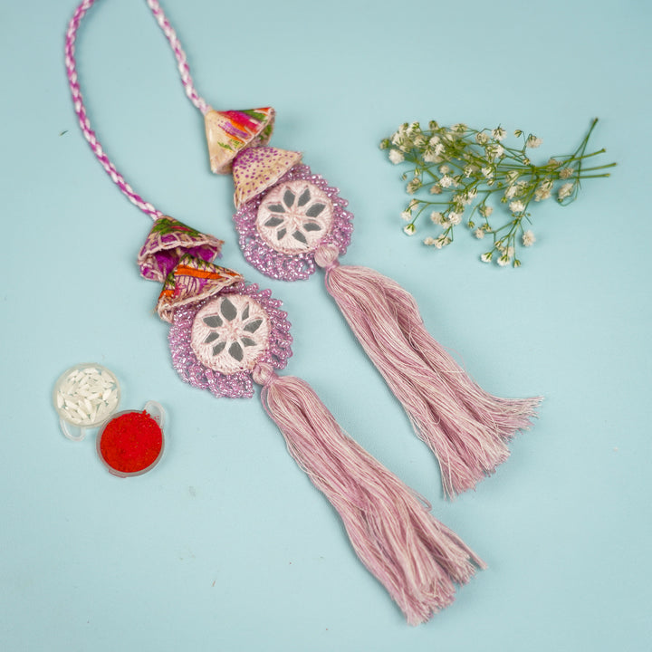 Handmade Reusable Lavender Mirror And Jhumki Rakhi For Bhabhi - Flat Lay Display with Accessories