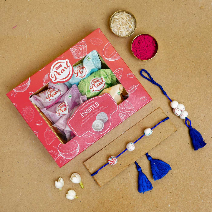 Handmade Shweth Potli Upcycled Fabric Bhaiya Bhabhi Rakhi With Roli Chawal Set Of 2 - Rakhi with sweets and ceremonial items