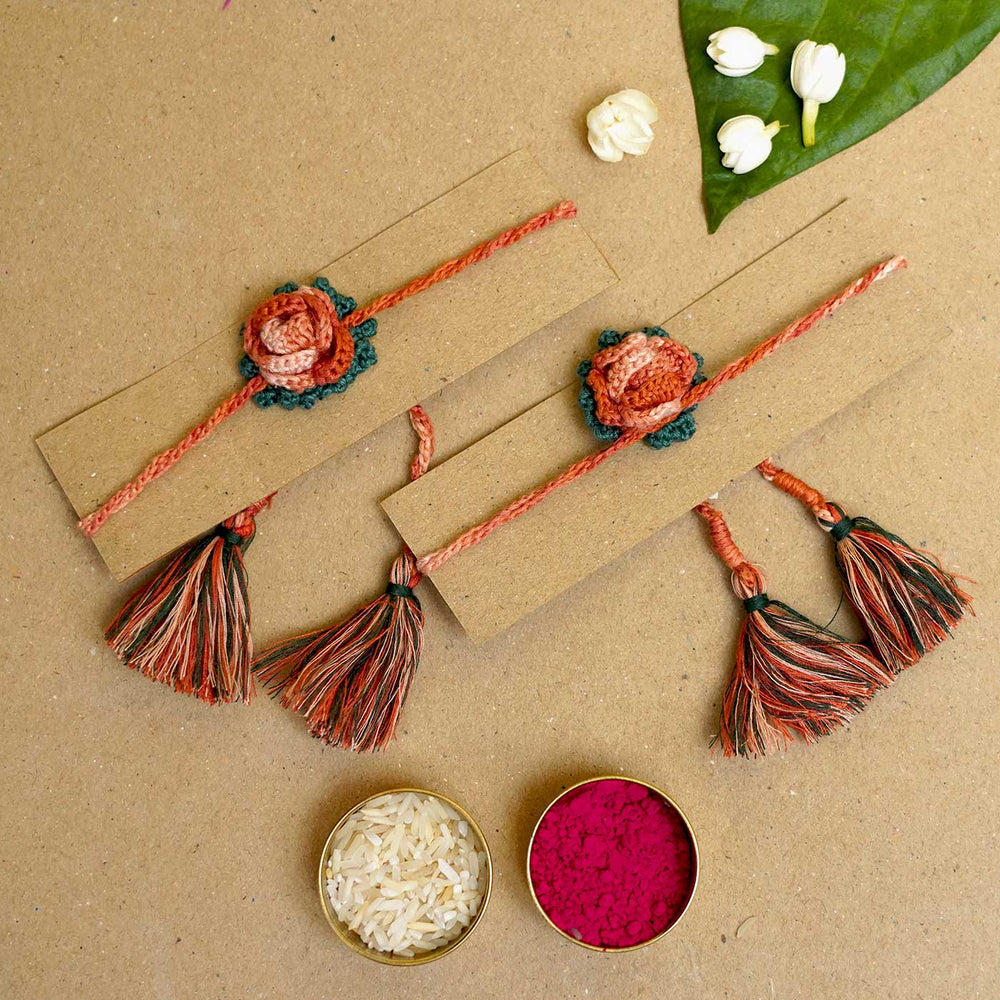 Handmade Crochet Rosette Bhaiya Bhabhi Rakhi With Roli Chawal Set Of 2 - Packaged Rakhi Set