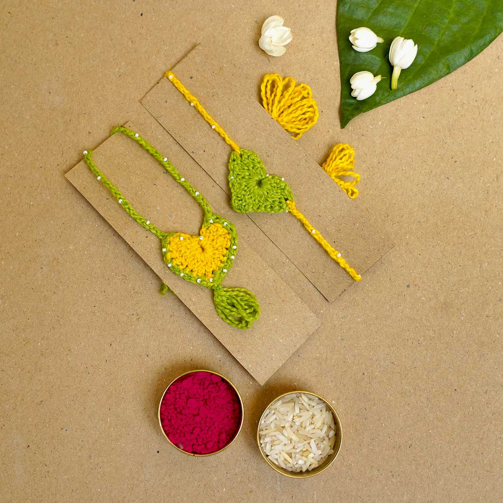 Handmade Crochet Heartfelt Ties Bhaiya Bhabhi Rakhi With Roli Chawal Set Of 2 - Wristbands on card with decorations
