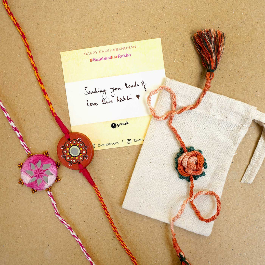 Handmade Mirror Work Patwa Maroon Green Cotton Rakhi With Roli Chawal Set Of 2 - Rakhis with message card and pouch