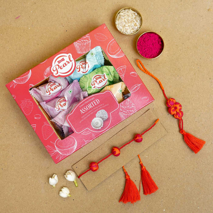 Handmade Kesari Potli Upcycled Fabric Bhaiya Bhabhi Rakhi With Roli Chawal Set Of 2 - Bracelets with assorted sweets packaging