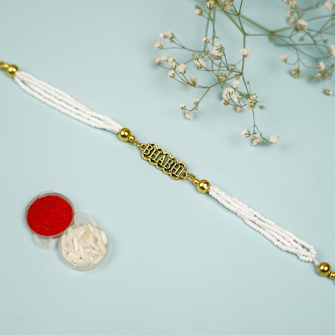 Photo Personalized Handmade Bhai And Bhabhi Theme Rakhi Hamper Includes 2 Mug 2 Rakhi - Close-up of Bhabhi Rakhi with Gifts