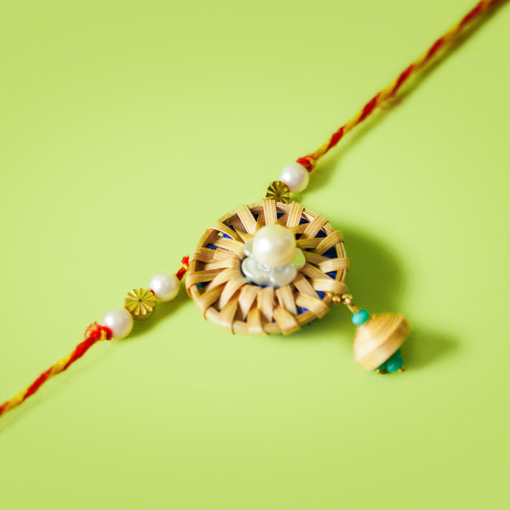 Ecofriendly Bamboo Woven Quilled Lumba Rakhi - Close-up of Circular Design