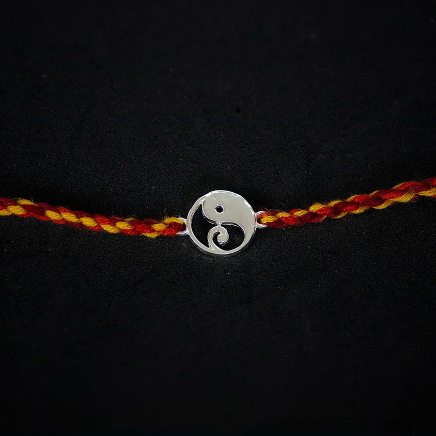 Handmade Bappa 925 Silver Rakhi With Roli Chawal For Brother - Close-up of Pendant Centerpiece