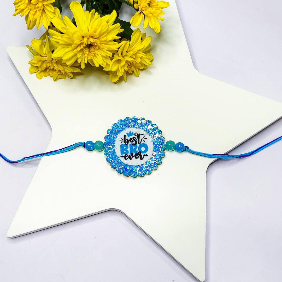 Sparkly Strong Bro Elephant Rakhi - Front View with Blue "Best Bro Ever" Design