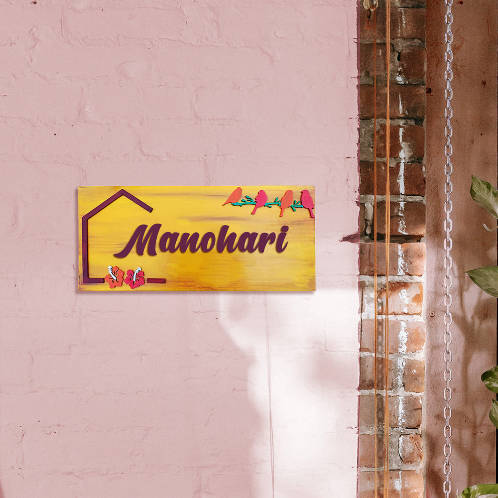 Hand Painted Personalized Bird Name Plate 1 - Mounted on Pink Wall with Shadow