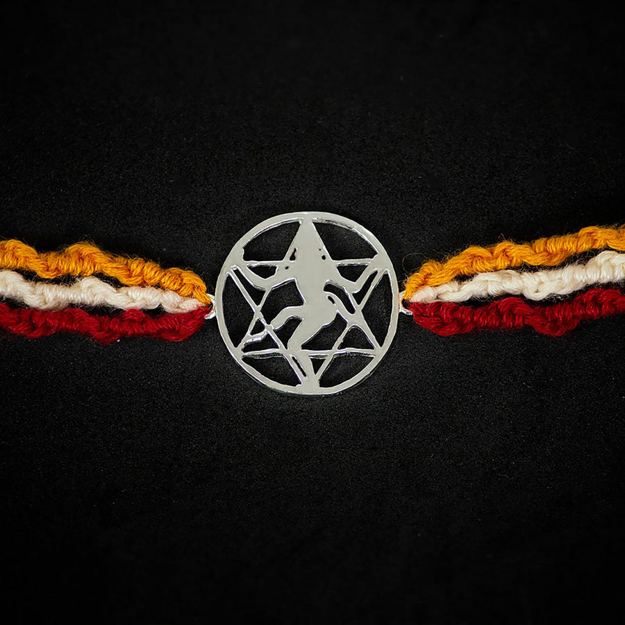 Handmade Bhairav 925 Silver Rakhi With Roli Chawal For Brother - Close-up of central charm and threads