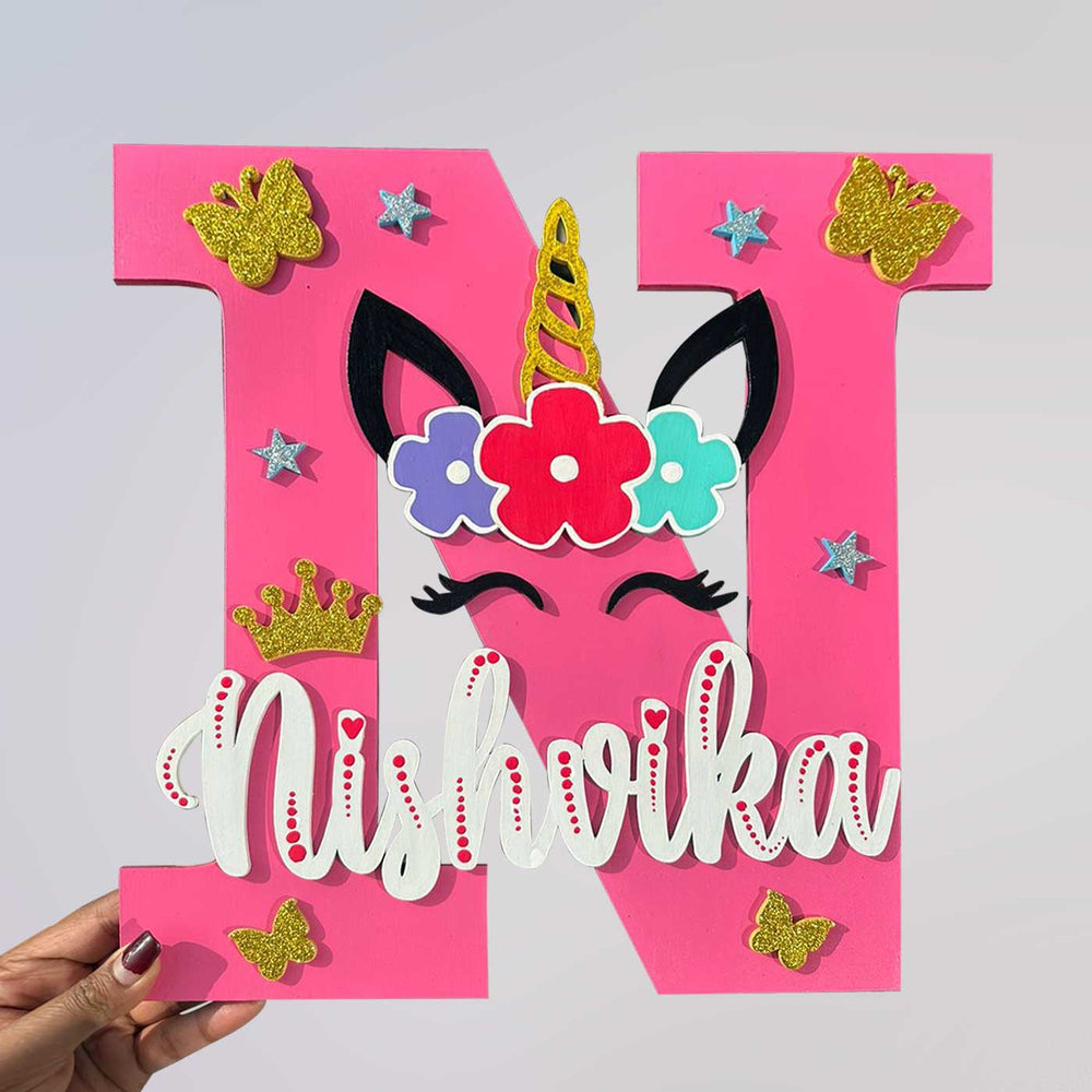 Handcrafted Personalized Kids Unicorn Eyes Themed Monogram Mdf Nameplate - Front View with Hand Holding