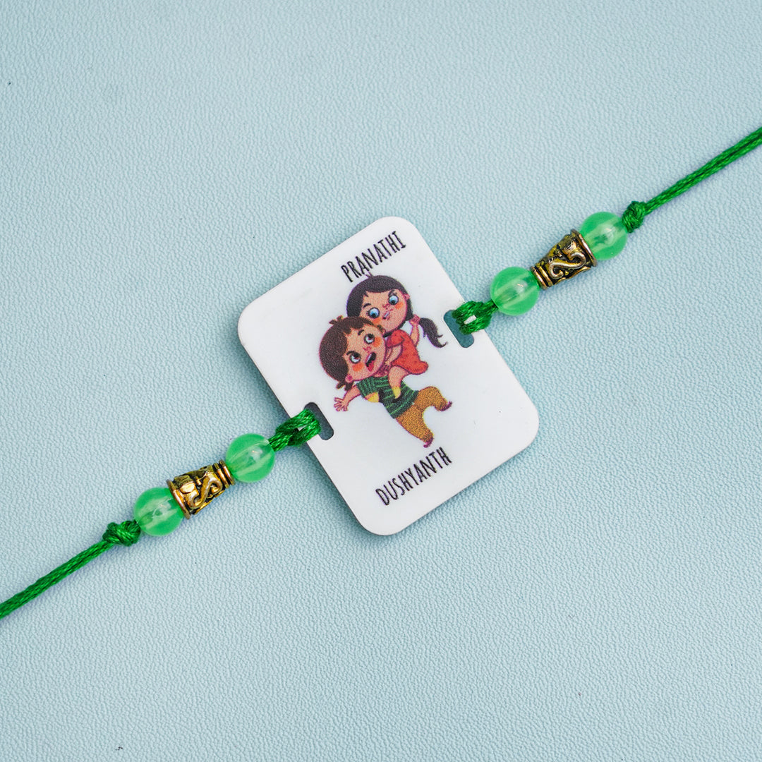 Personalized Handmade Printed Bro And Sis Acrylic Rakhi With Roli Chawal - Front View with Name Personalization