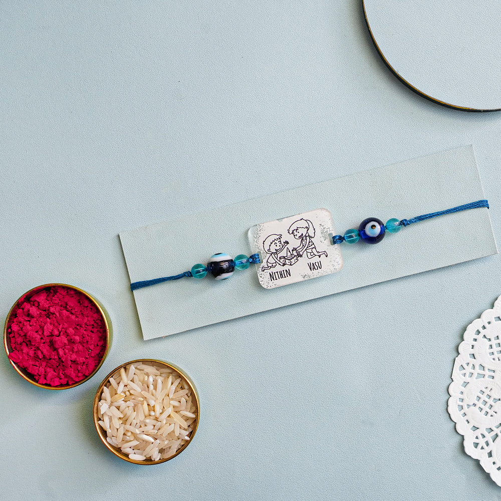 Personalized Handmade 3D Line Art Bro And Sis Evil Eye Beads Acrylic Rakhi With Roli Chawal - Mounted on Card with Accessories