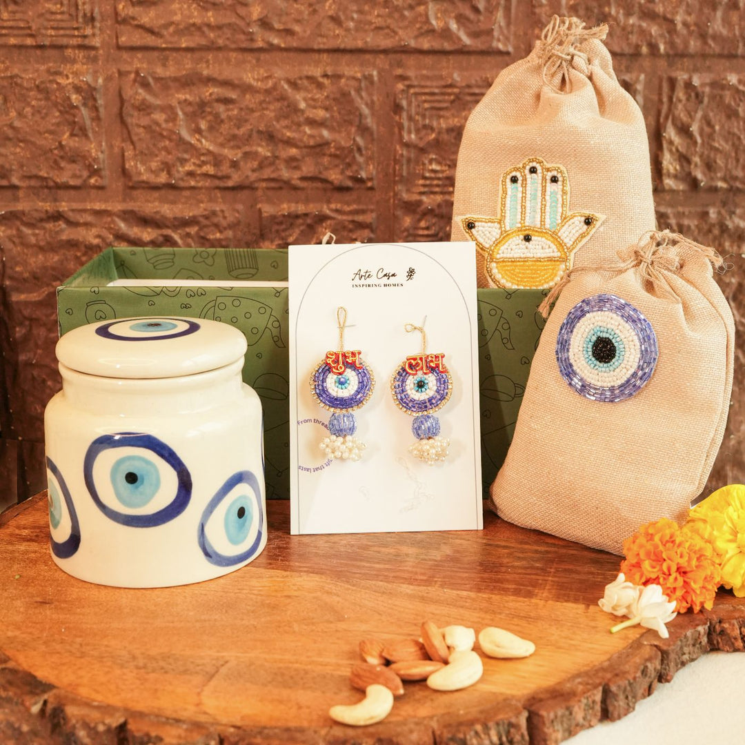 Shubh Nazar Diwali Gift Hamper | Includes 1 Storage Container, 2 Hangings, 2 Dry Fruit Potlis, 1 Diwali Card, 1 Gift Box