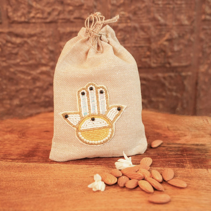 Shubh Nazar Diwali Gift Hamper | Includes 1 Storage Container, 2 Hangings, 2 Dry Fruit Potlis, 1 Diwali Card, 1 Gift Box