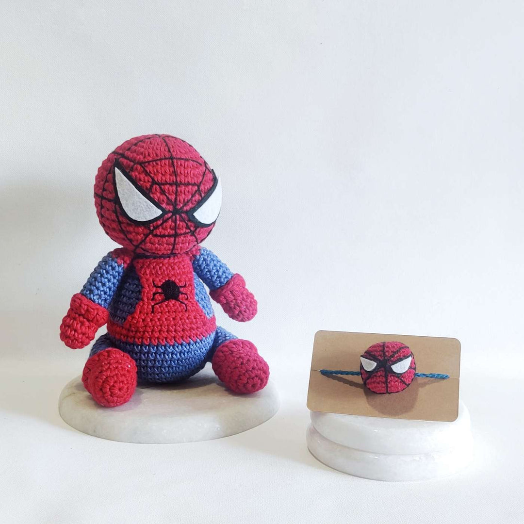 Handmade Crochet Spiderman Kids Rakhi With Roli Chawal - Set Display on Marble Base