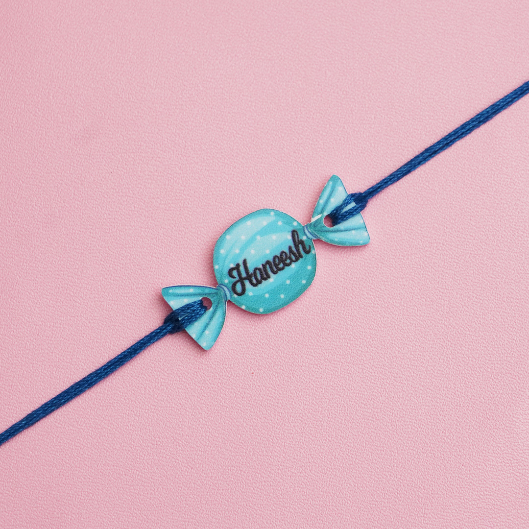 Personalized Handmade Candy Acrylic Kids Rakhi With Roli Chawal - Close-up of personalized bracelet